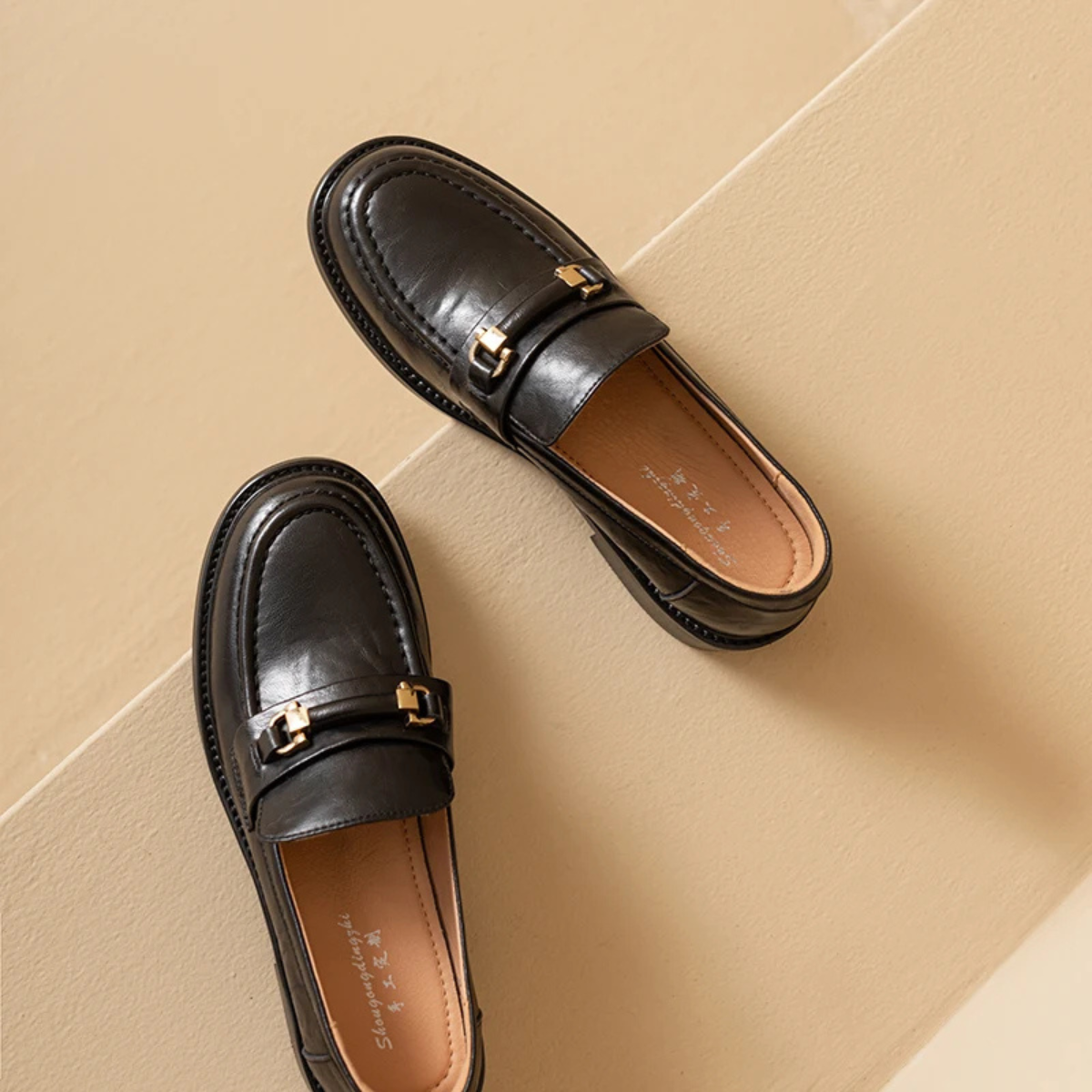 The Montepulciano Men’s Classic Slip On Leather Loafers with Metal Buckle