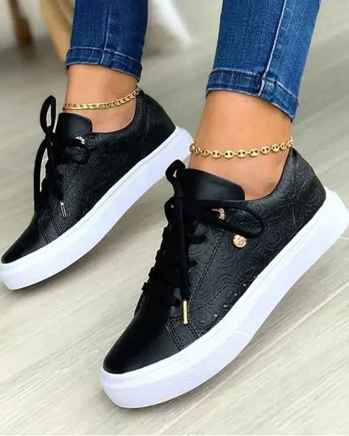 Stylish sneakers featuring gold accents
