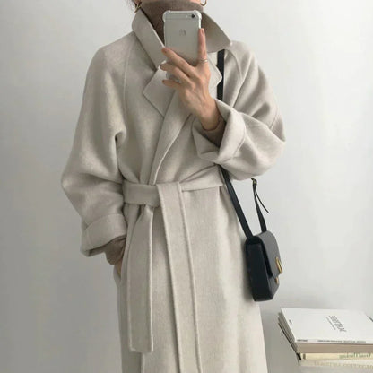 Warm, padded winter jacket for women with full length