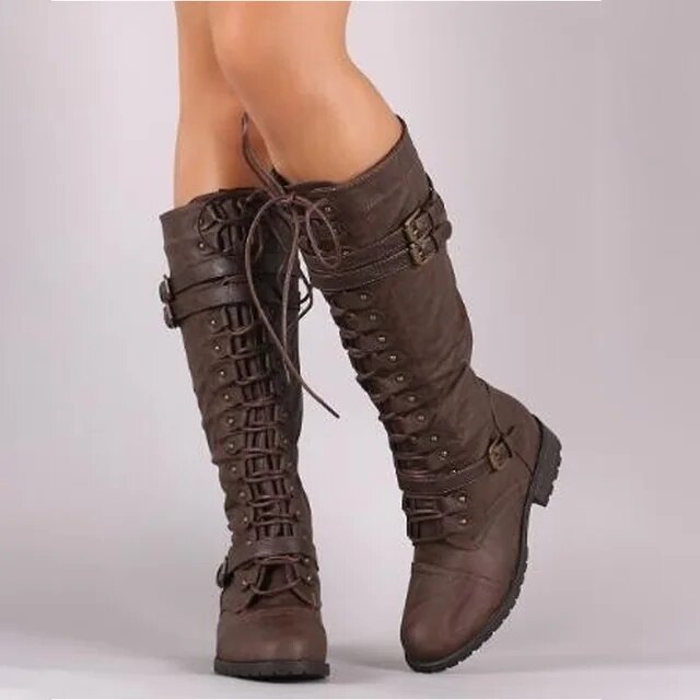 Vintage-style lace-up flat boots for women, featuring steampunk buckles