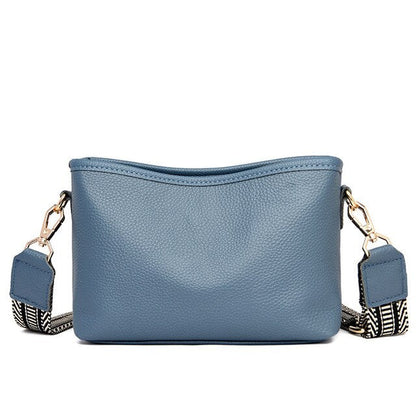 Small shoulder bag for women with wide guitar strap