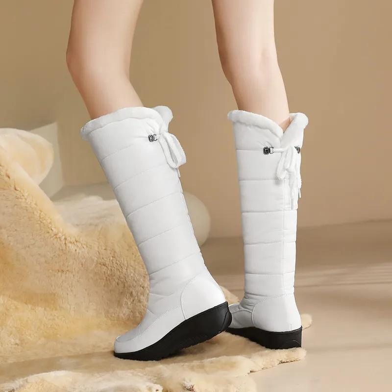 Women's winter boots with fur lining - knee-high and warm for snowy days