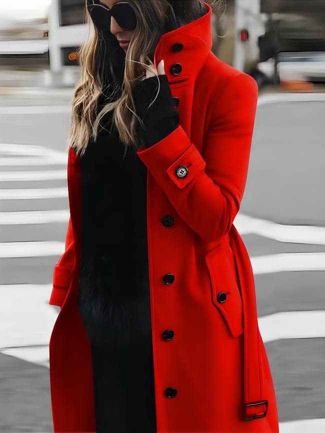 Stylish long women's coat with a high collar and elegant bow belt